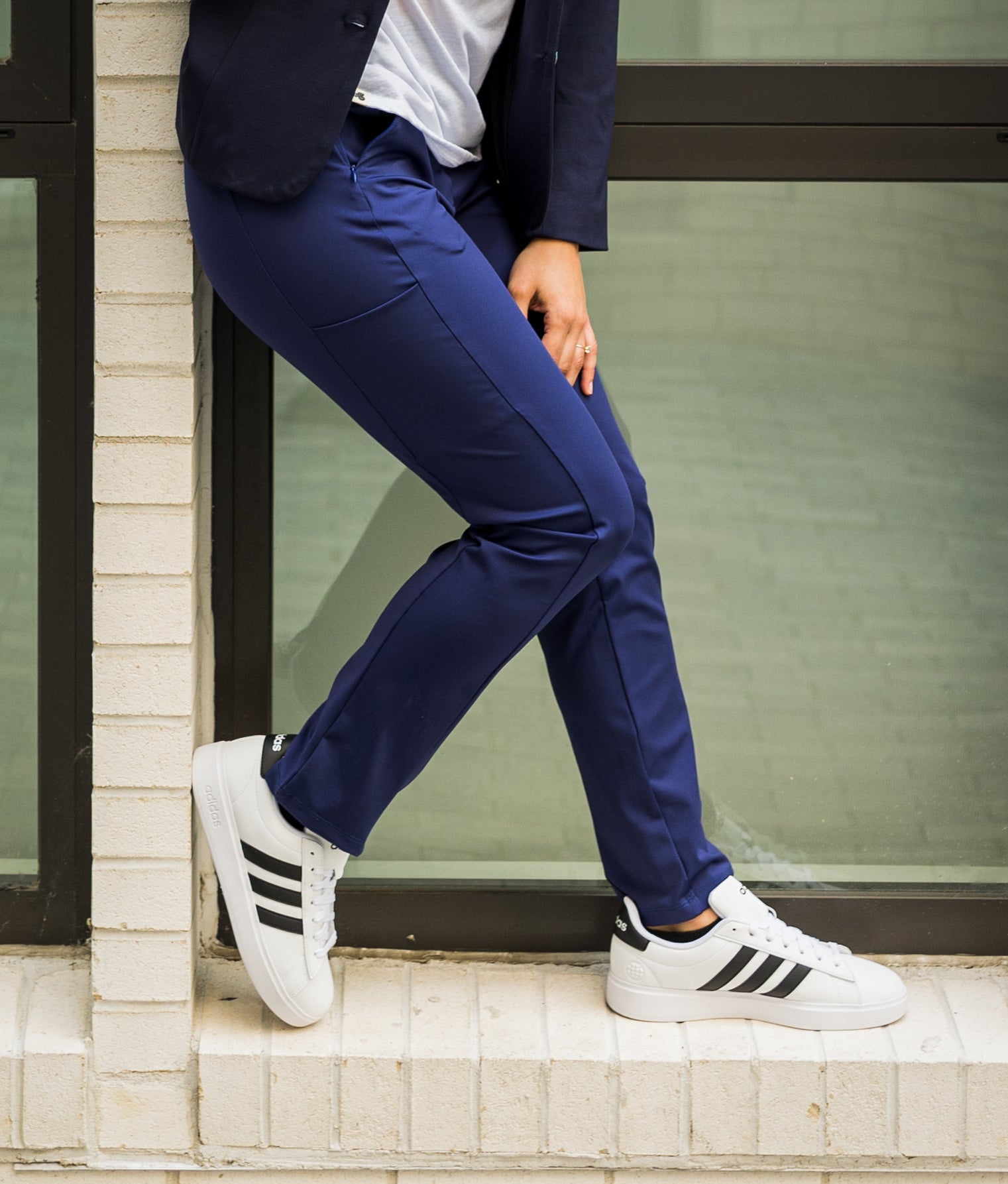 The Tenacity Pants are the ultimate dress pants for women, featuring a form-fitting design with recoverable stretch to accommodate various body shapes. A mid-rise waist and concealed contour waistband provide comfort and flexibility, while the tailored straight leg offers a polished look for professional settings.