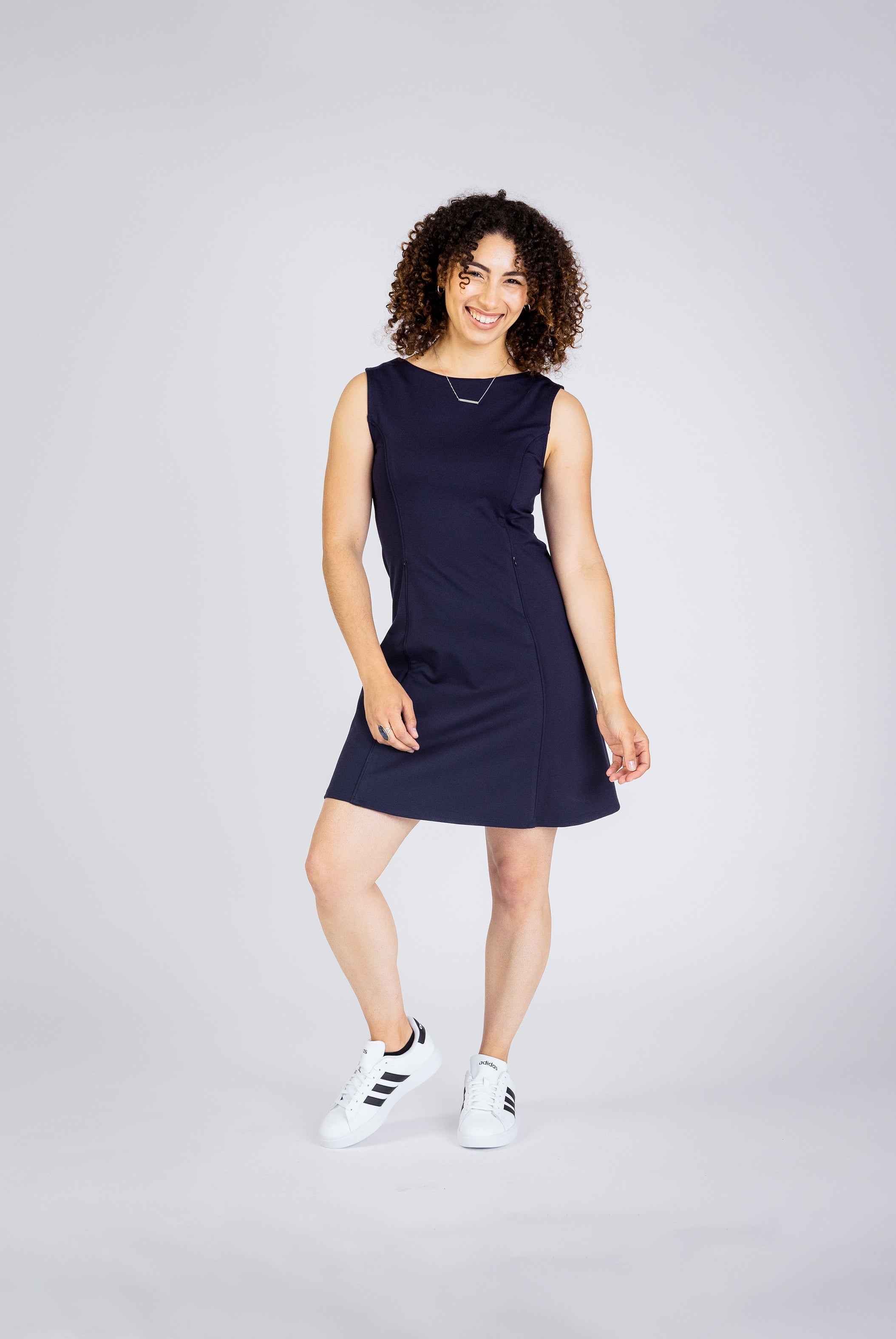 This versatile Taylor Reversible Dress is crafted to be worn both front and back, with functional pockets that add practicality to its polished look—ideal for women’s corporate wear and business casual outfits