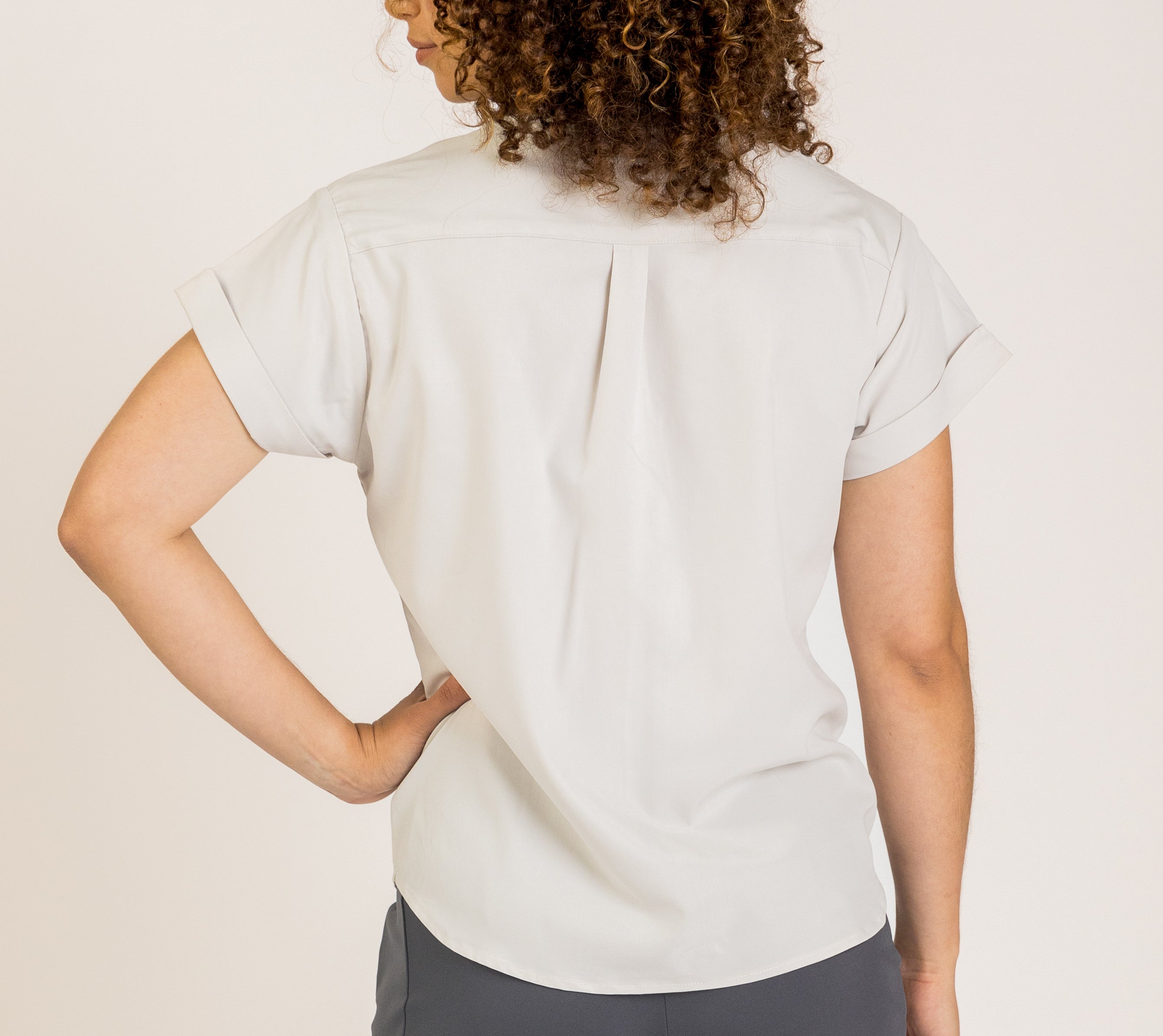 The Virgo V-Neck Top combines comfort with sophistication, perfect for women’s corporate wear. Its loose, flattering fit and tailored v-neck design make it an ideal choice for business casual outfits, providing all-day comfort for professional settings