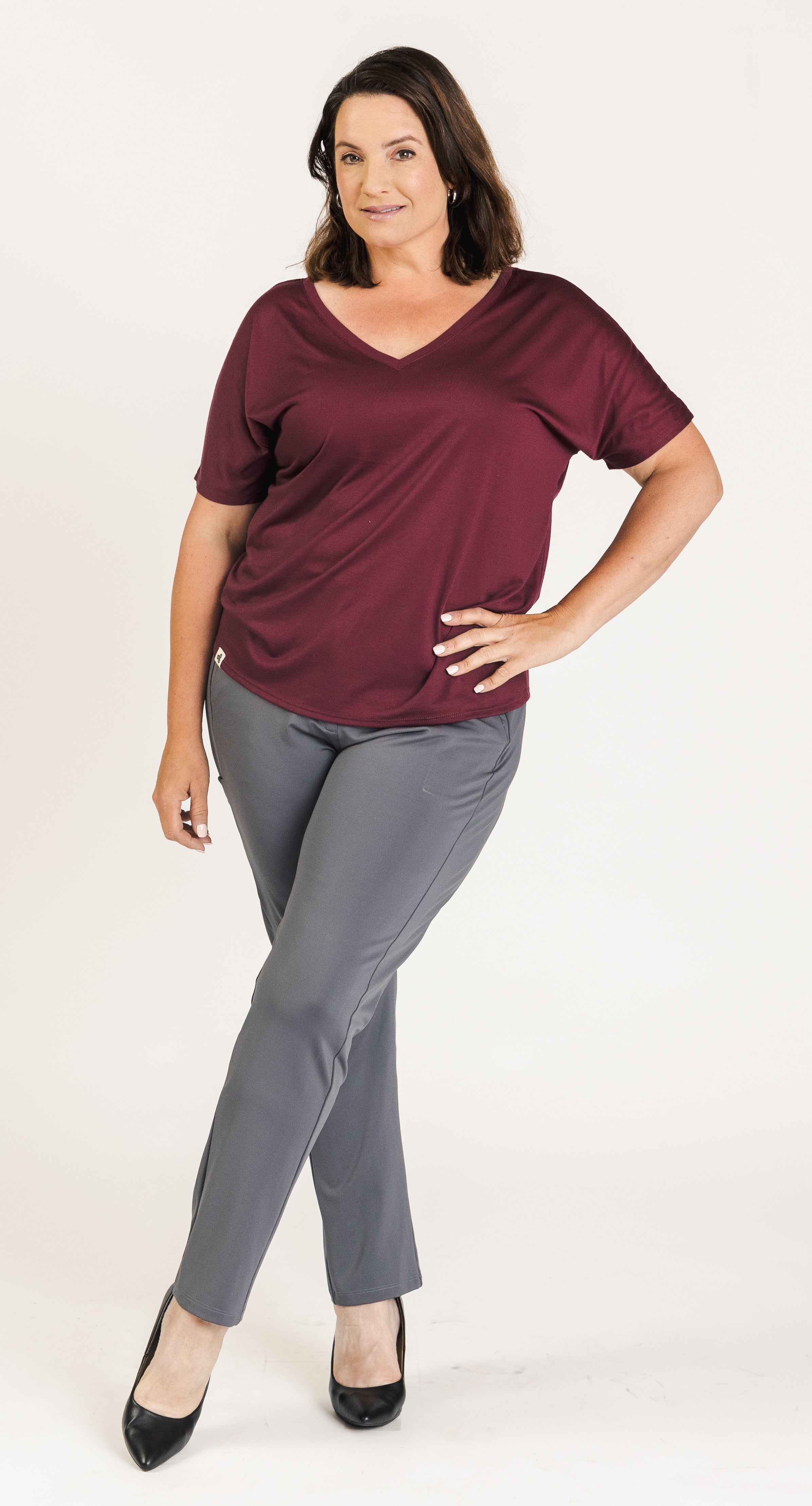 SISU Journey V-Neck, a soft, relaxed top with a comfortable fit, perfect for women’s corporate wear. Ideal for layering under blazers or wearing alone in business casual settings