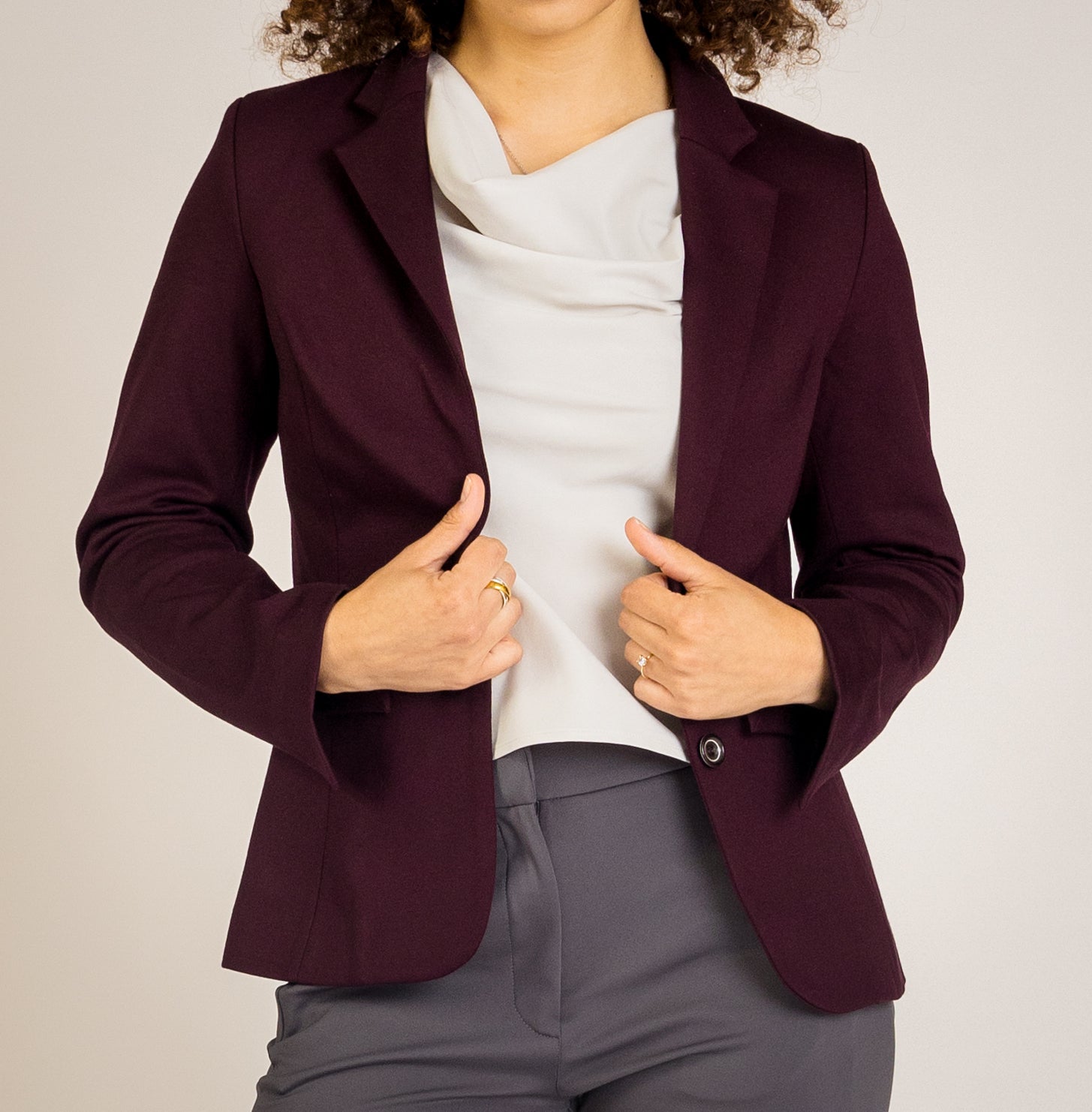 Elevate your business wardrobe with the Destiny Blazer, designed with performance fabric for flexibility and durability. Featuring adjustable cuffs and three convenient pockets, this blazer is perfect for professional women seeking style and functionality in corporate wear