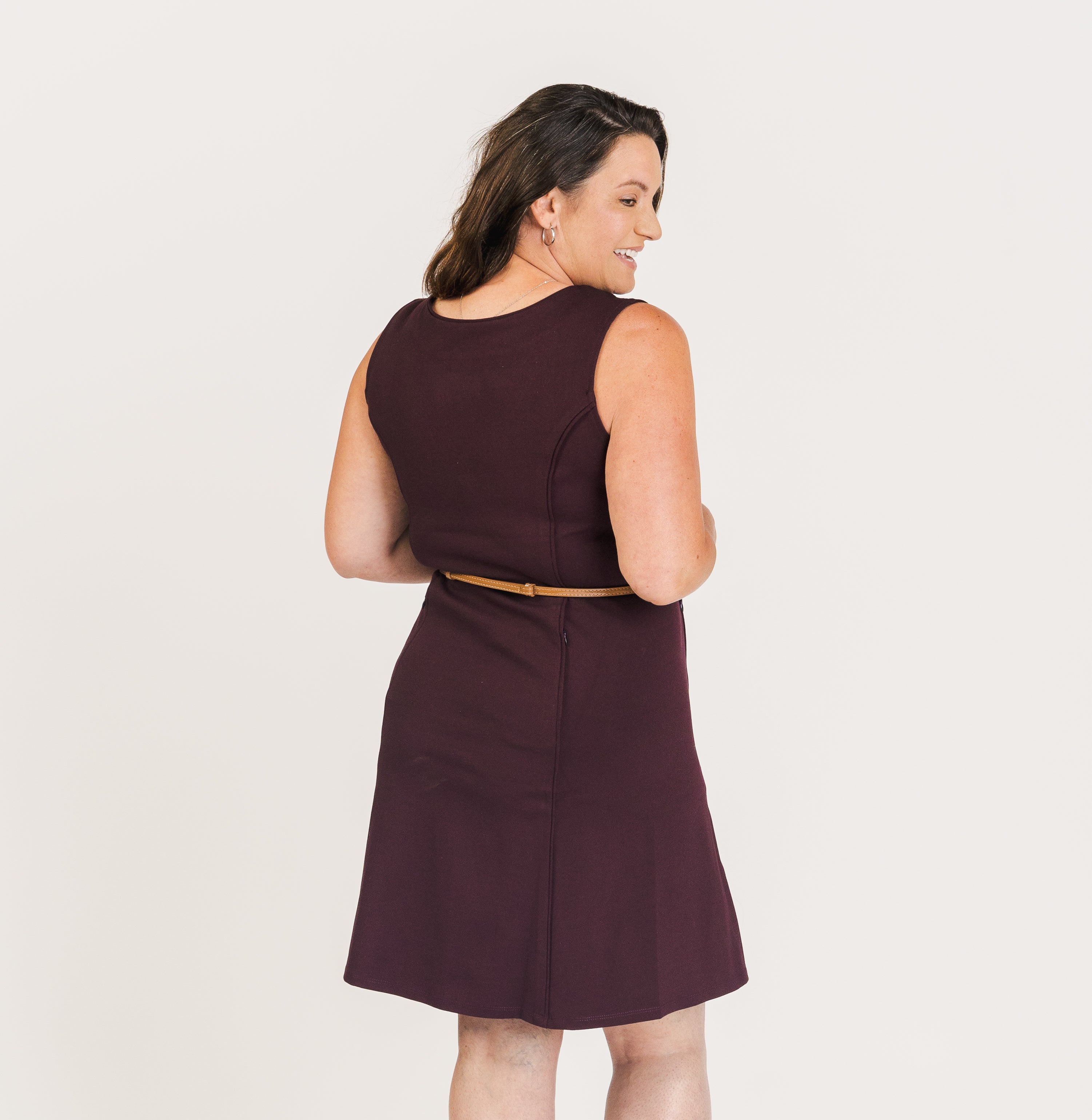 Taylor Reversible Dress with a reversible front-to-back style and functional pockets, blending practicality with elegance for women’s workwear and business casual outfits.